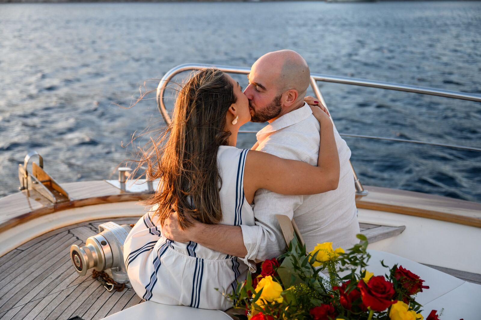 A kiss on deck in the evening breeze off Capri